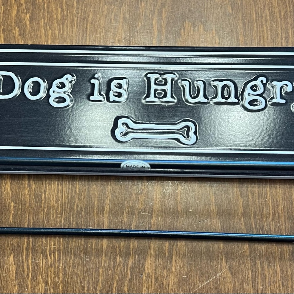 Black Dog Feeding Sign